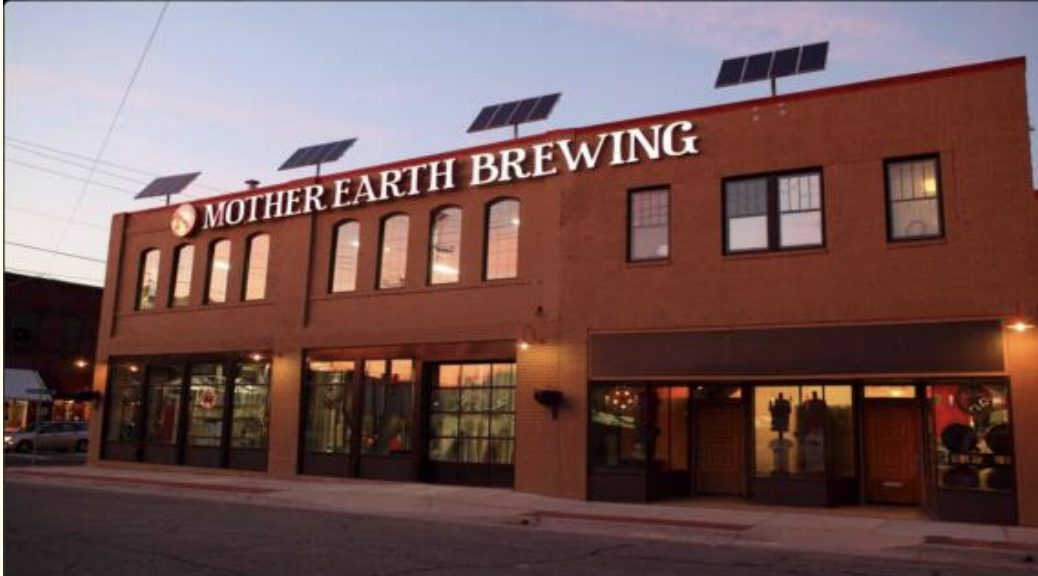 Mother Earth Brewing storefront in downtown Kinston at dusk